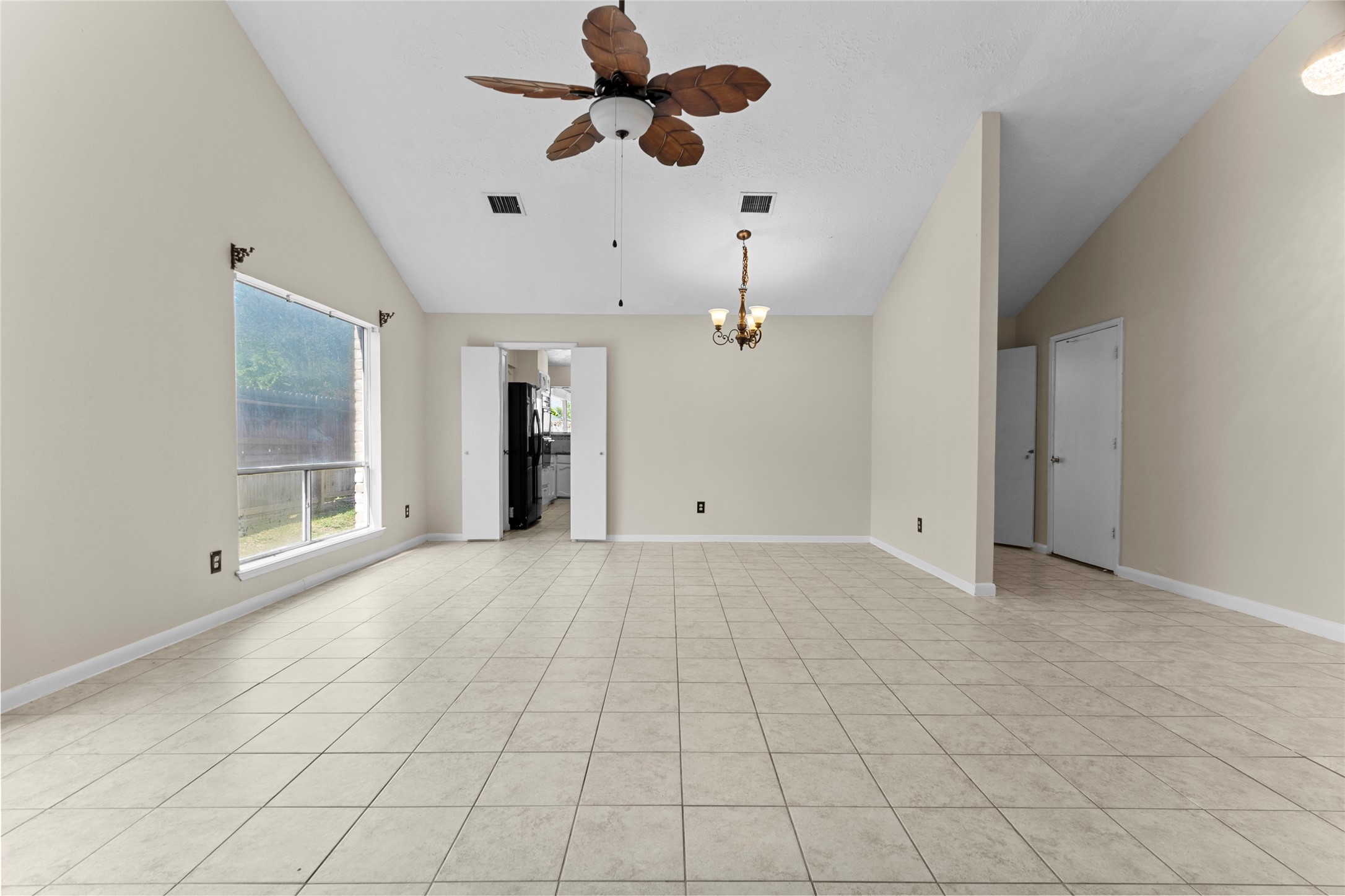 6630 Brownie Campbell Road Houston, TX 77086 - Photo 8 of 28 a view of an empty room with a window