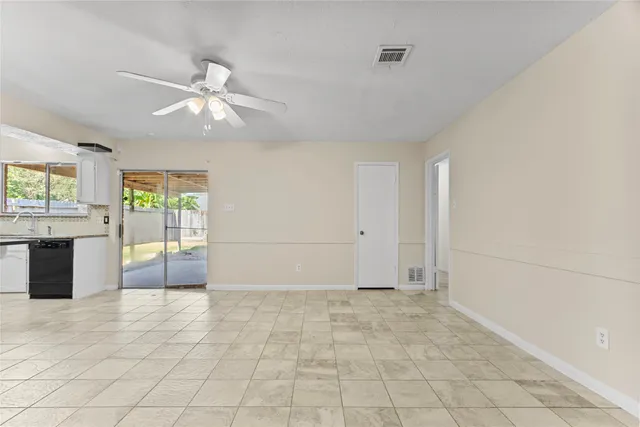a view of a kitchen with an empty space