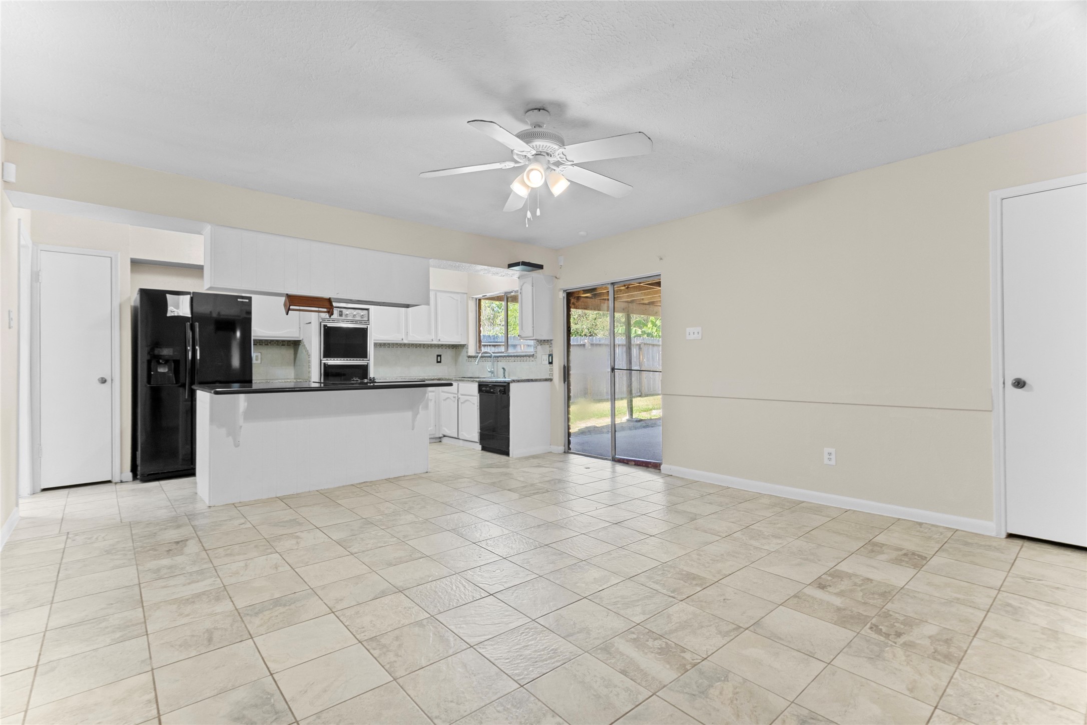 6630 Brownie Campbell Road Houston, TX 77086 - Photo 10 of 28 a view of a kitchen with an empty space