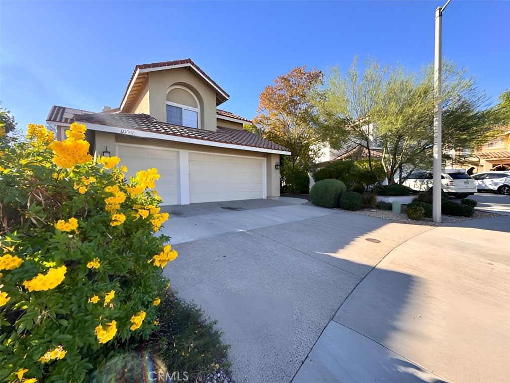 40085 Temecky Way Murrieta, CA 92562 - Photo 1 of 55 a front view of a house with a yard