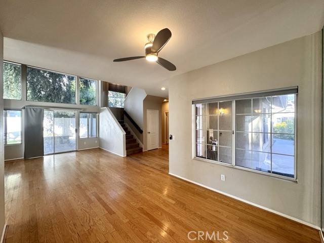 40085 Temecky Way Murrieta, CA 92562 - Photo 12 of 55 a view of empty room with wooden floor and fan