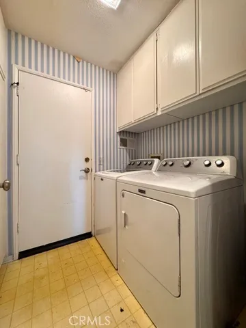a view of a hallway view with wooden floor and staircase