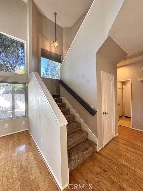 40085 Temecky Way Murrieta, CA 92562 - Photo 25 of 55 a view of a hallway view with wooden floor and staircase