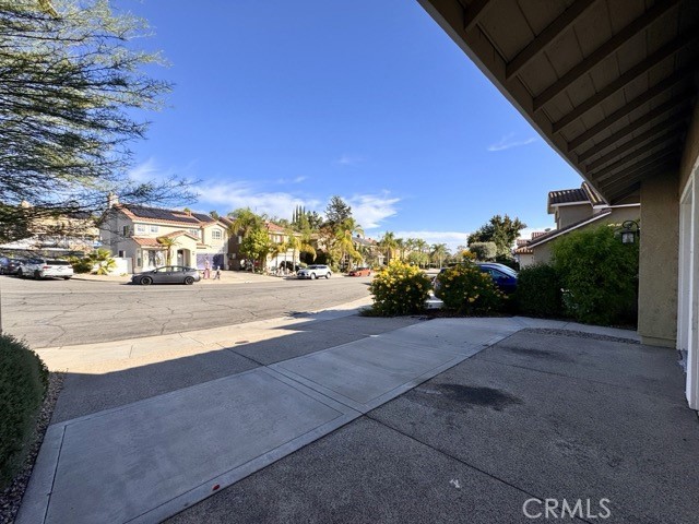 40085 Temecky Way Murrieta, CA 92562 - Photo 3 of 55 a view of street with flower on side of it