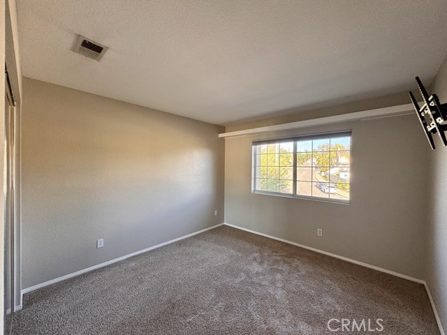 40085 Temecky Way Murrieta, CA 92562 - Photo 37 of 55 a view of an empty room with a window
