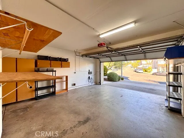 a view of a cafe with sitting area