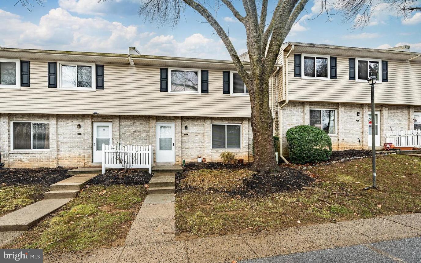 207 Village Walk, Unit 207 Exton, PA 19341 - Photo 16 of 17 Charming townhome with inviting curb appeal.