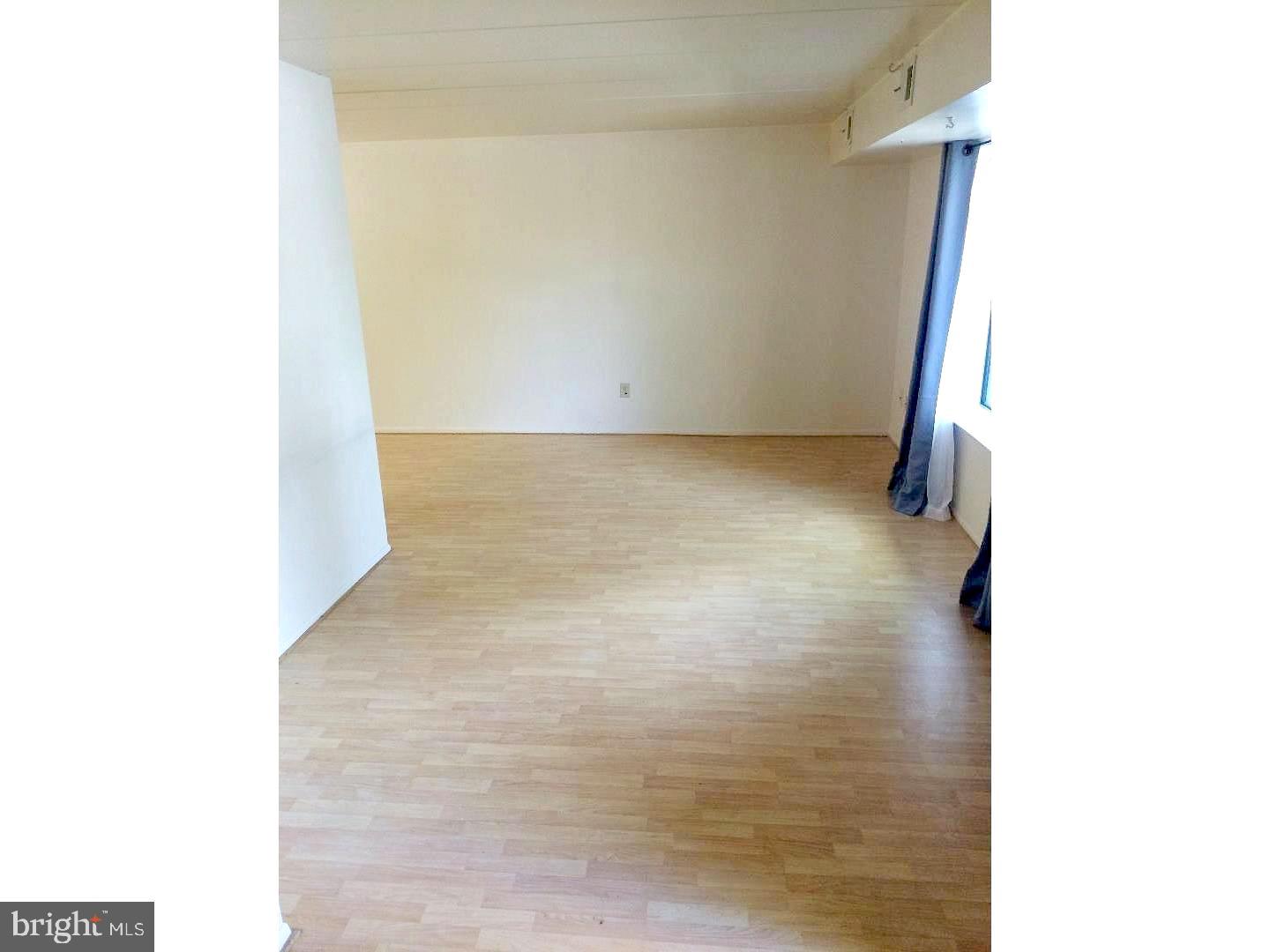 207 Village Walk, Unit 207 Exton, PA 19341 - Photo 2 of 17 Spacious, sunlit room ready for your vision.