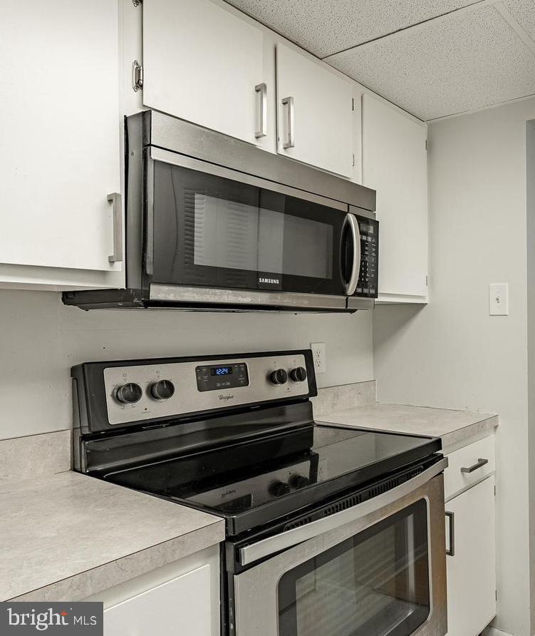 207 Village Walk, Unit 207 Exton, PA 19341 - Photo 5 of 17 Sleek kitchen with modern appliances.