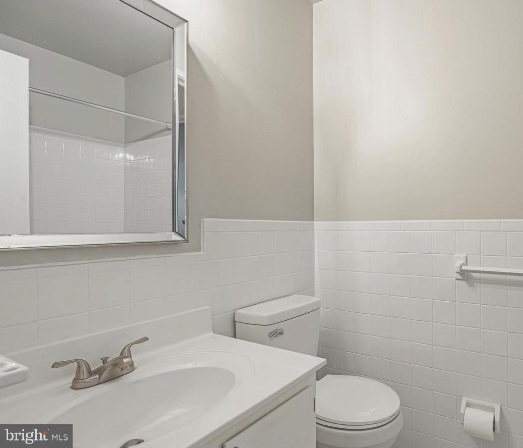 207 Village Walk, Unit 207 Exton, PA 19341 - Photo 9 of 17 Sleek and modern bathroom with clean lines.