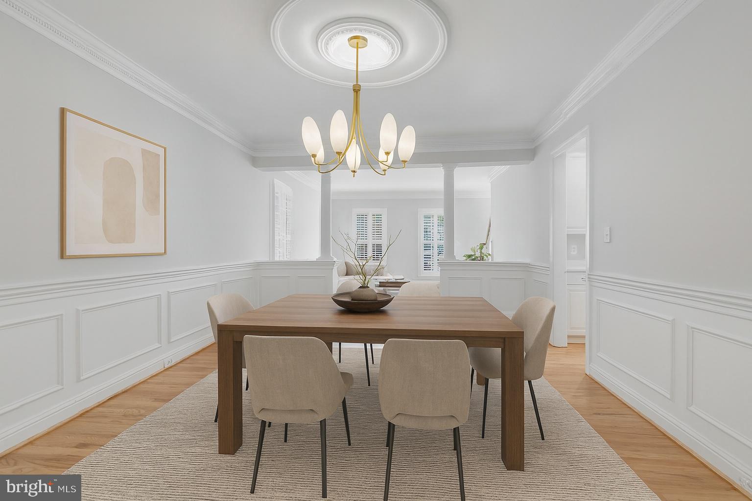 611 Catesby Court Southwest Leesburg, VA 20175 - Photo 13 of 96 a view of a dining room with furniture and chandelier