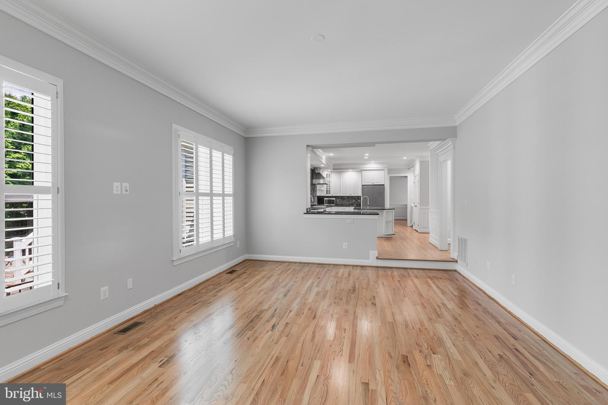611 Catesby Court Southwest Leesburg, VA 20175 - Photo 25 of 96 an empty room with wooden floor and windows