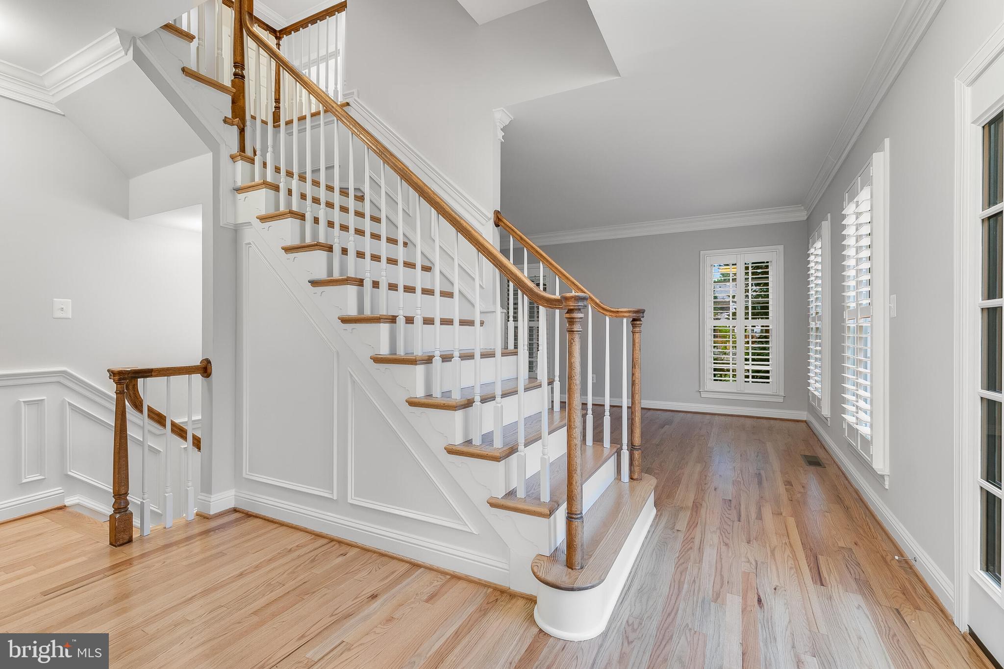 611 Catesby Court Southwest Leesburg, VA 20175 - Photo 3 of 96 a view of entryway with wooden floor and stairs