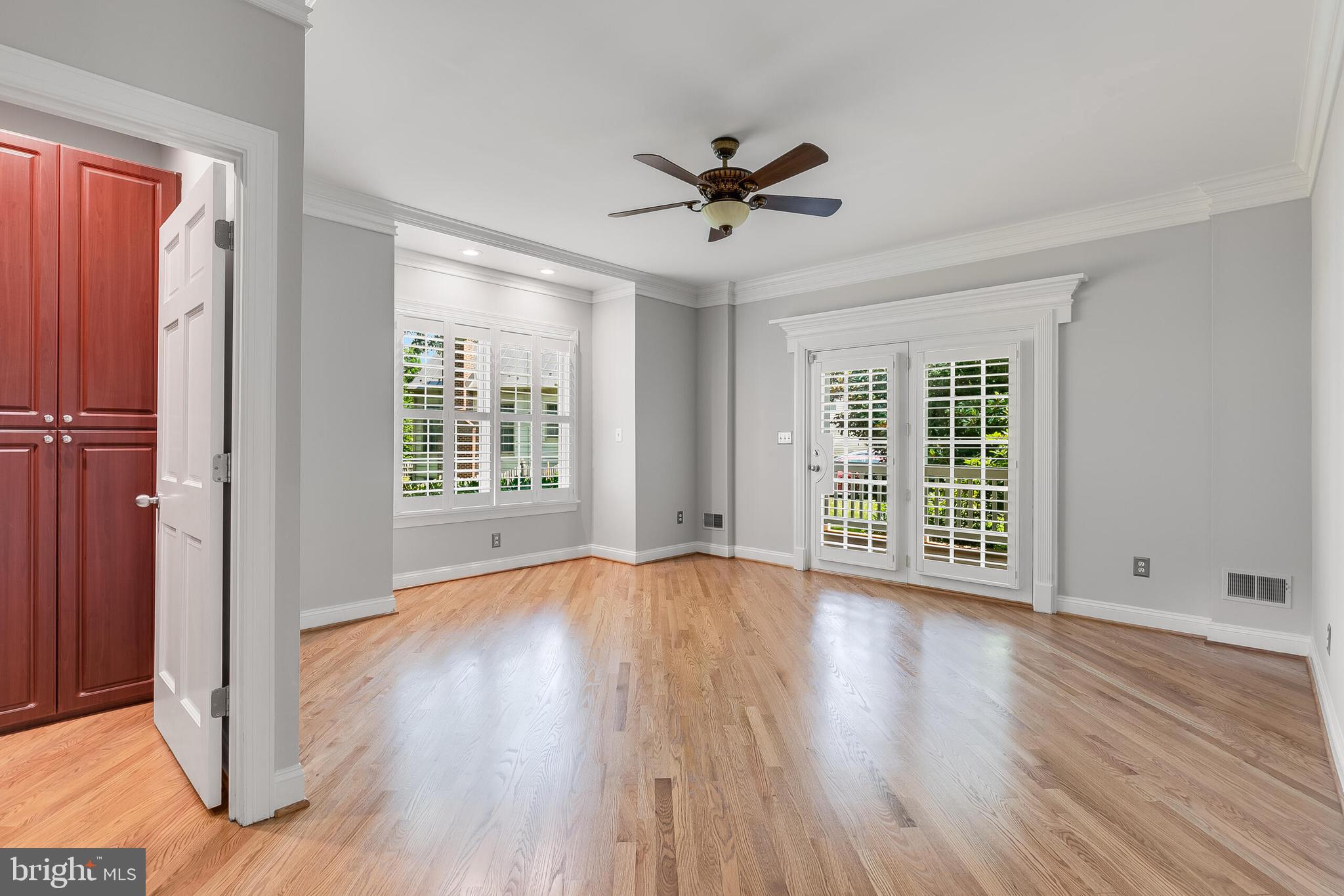 611 Catesby Court Southwest Leesburg, VA 20175 - Photo 39 of 96 a view of an empty room with wooden floor and a window