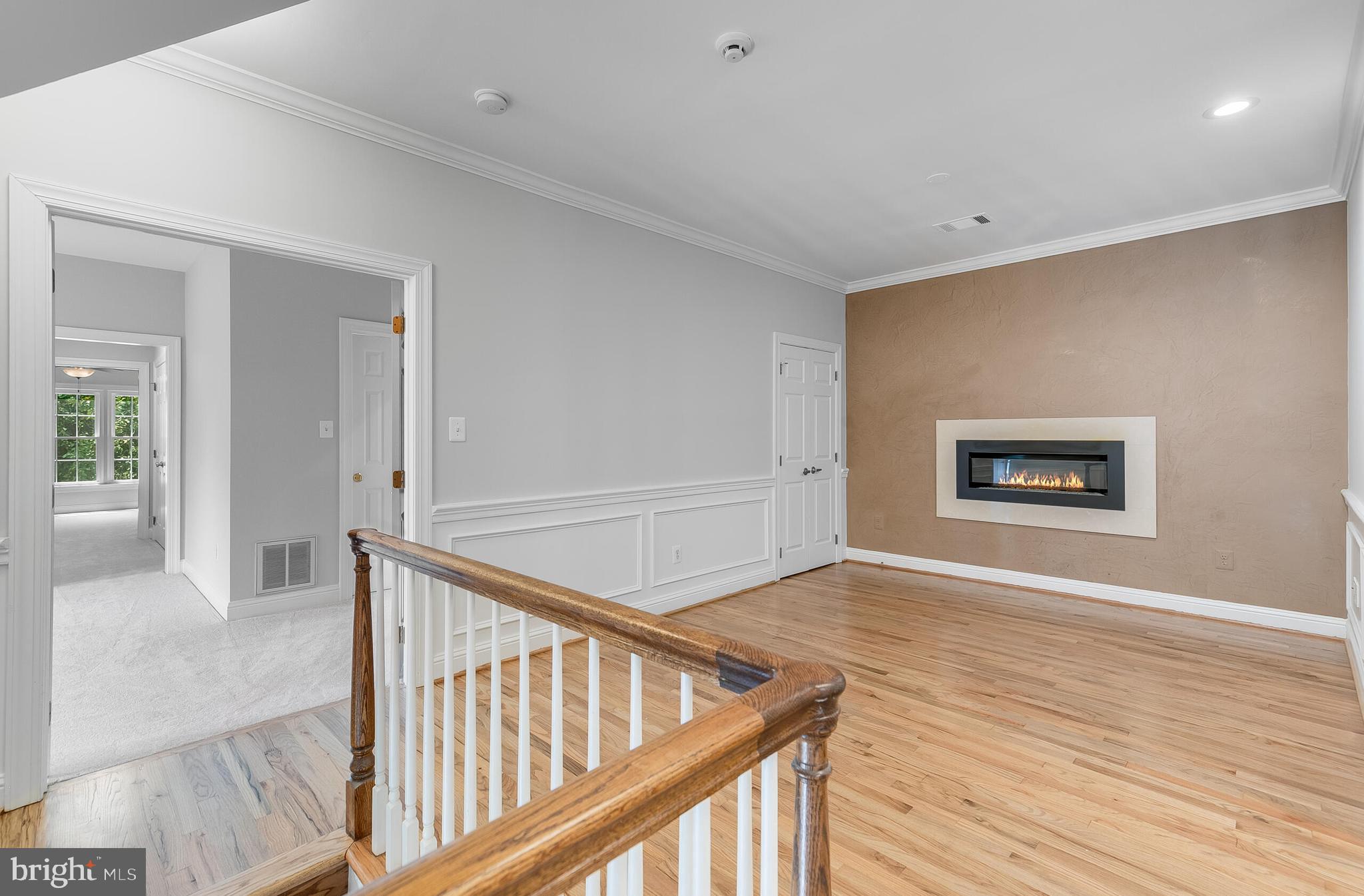 611 Catesby Court Southwest Leesburg, VA 20175 - Photo 44 of 96 a view of an empty room with wooden floor