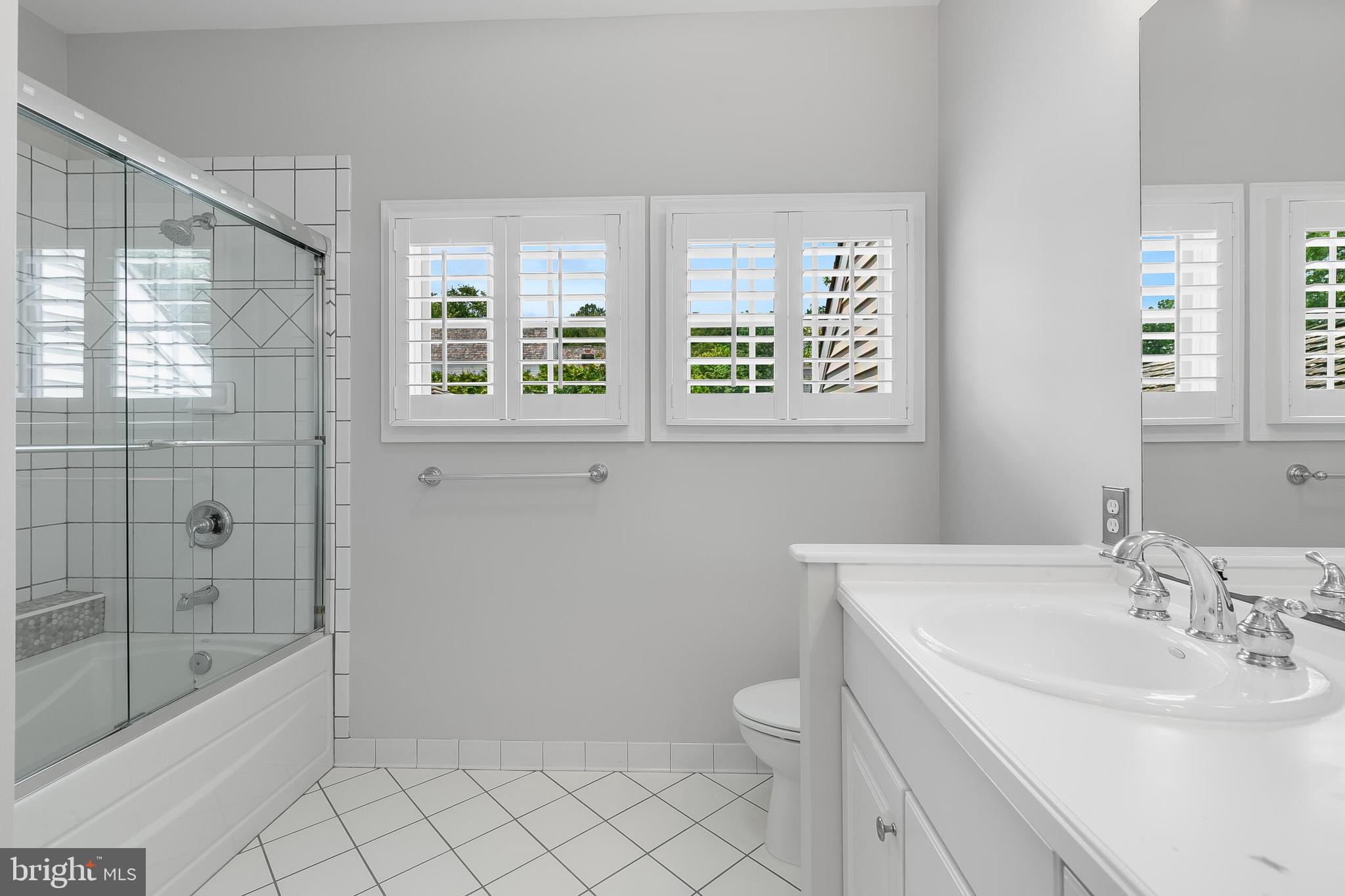 611 Catesby Court Southwest Leesburg, VA 20175 - Photo 55 of 96 a bathroom with a sink toilet and shower