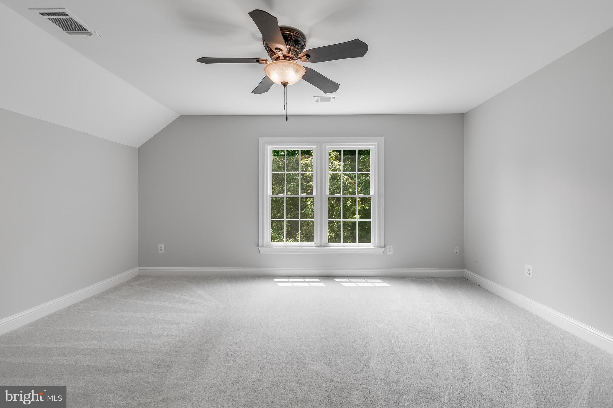 611 Catesby Court Southwest Leesburg, VA 20175 - Photo 58 of 96 a view of an empty room with a window