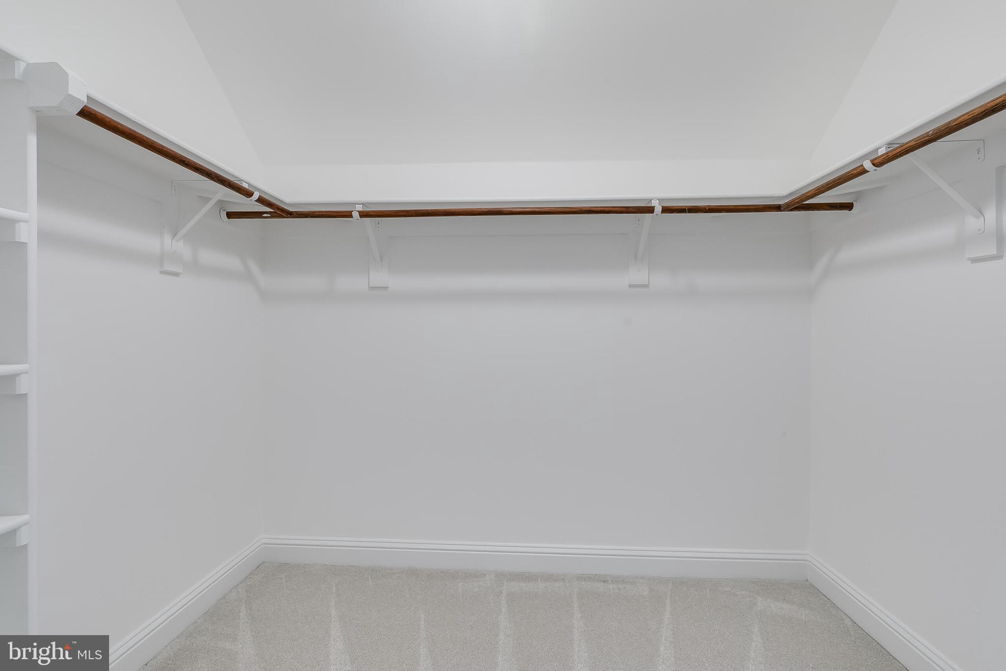 611 Catesby Court Southwest Leesburg, VA 20175 - Photo 59 of 96 a view of a room with racks on the wall