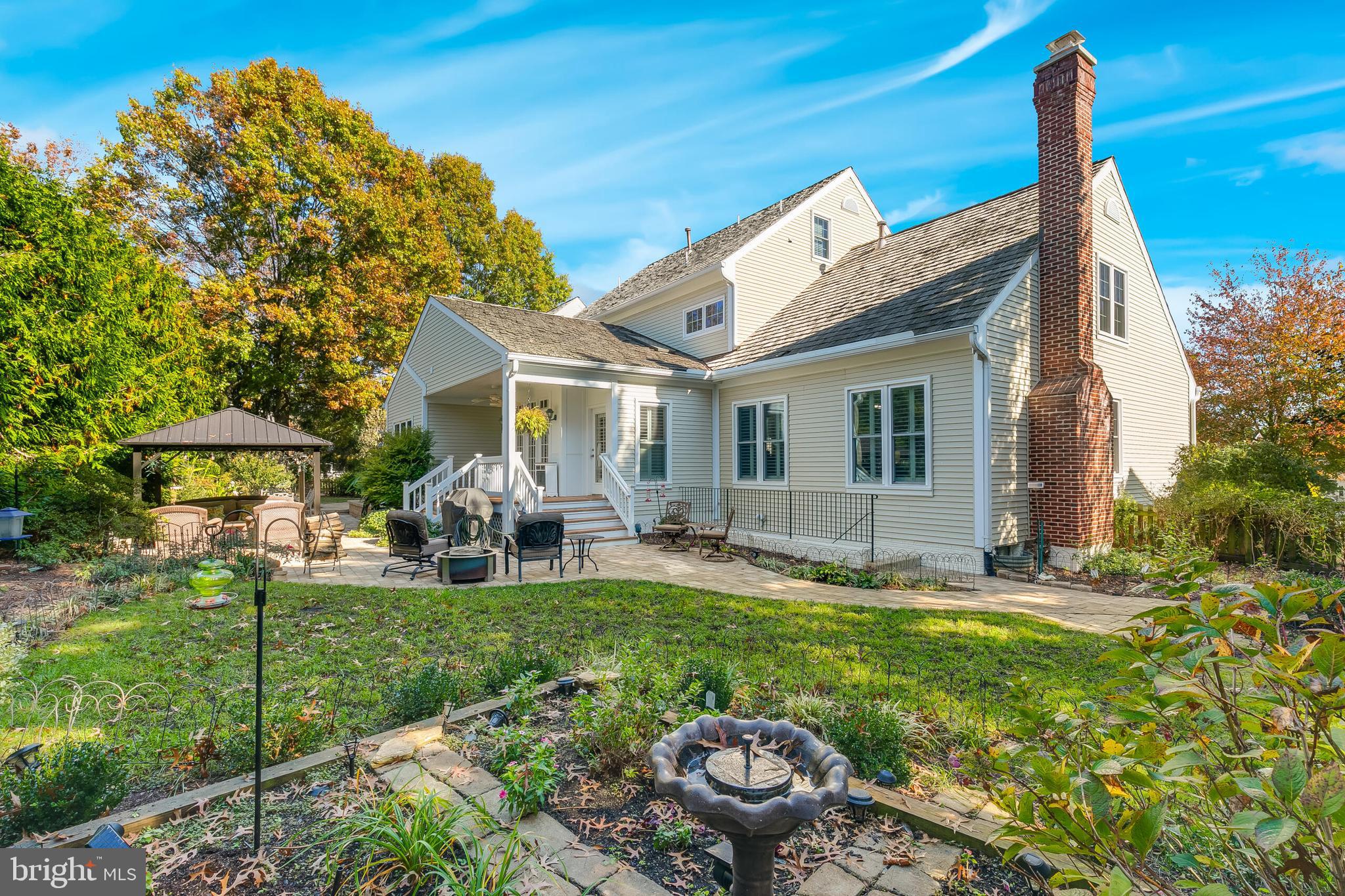 611 Catesby Court Southwest Leesburg, VA 20175 - Photo 93 of 96 a view of a house with backyard sitting area and garden