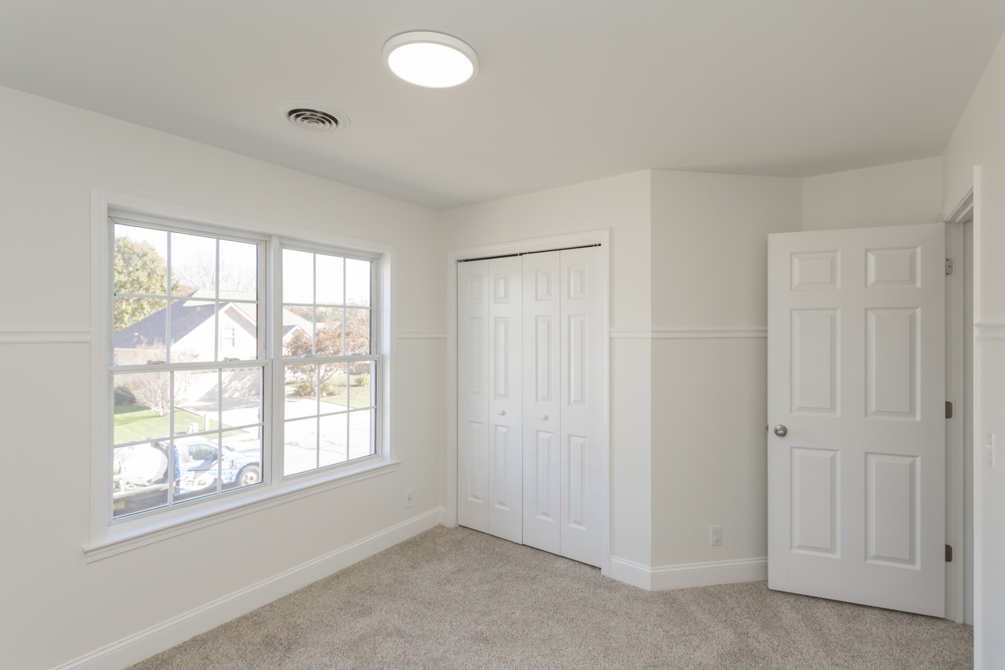 156 Foxrun Springfield, TN 37172 - Photo 27 of 33 an empty room with windows and closet