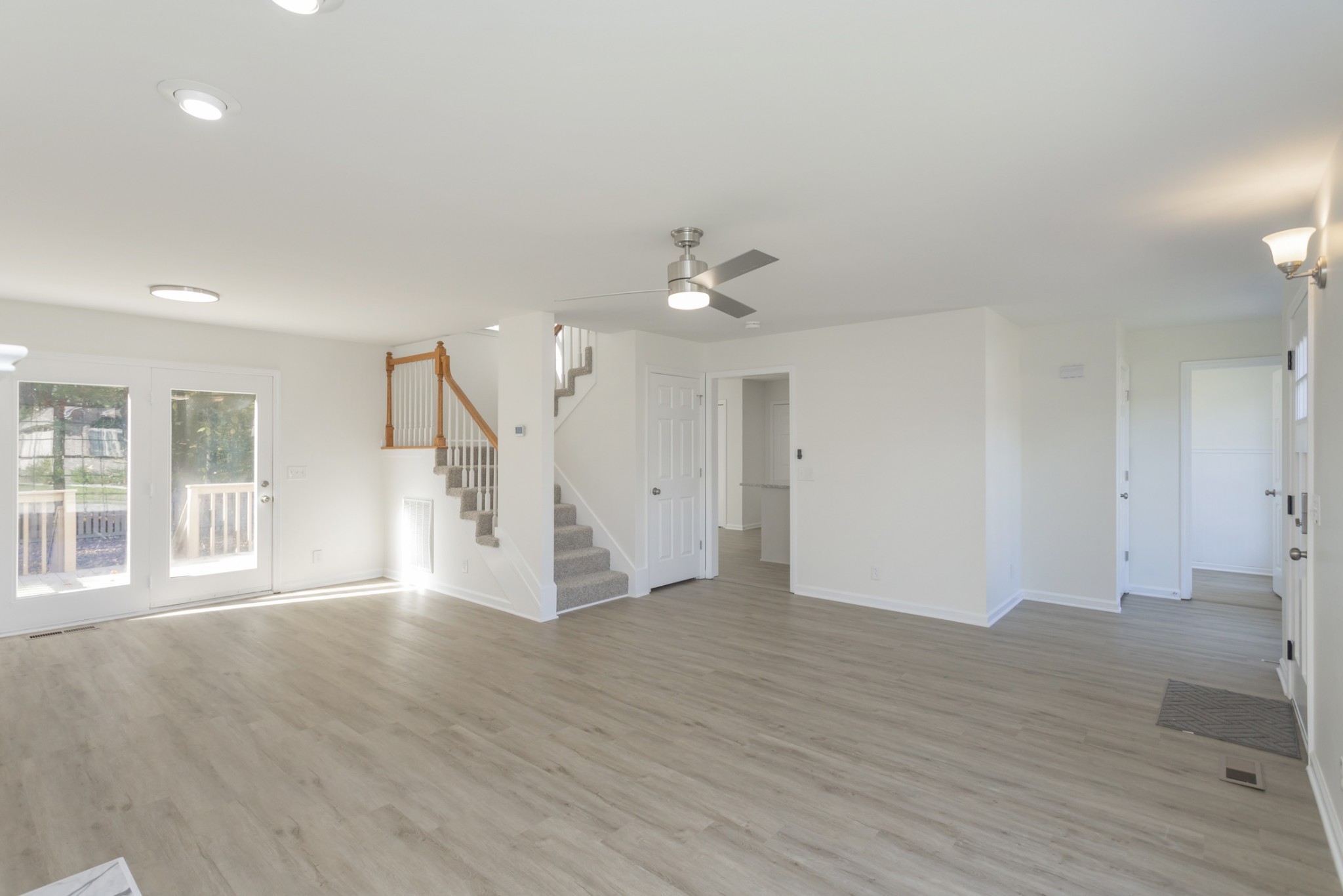 156 Foxrun Springfield, TN 37172 - Photo 9 of 33 a view of an empty room with wooden floor and a window
