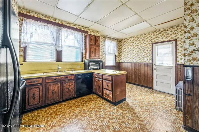 a room with sink and window