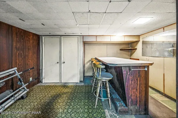 a room with furniture and a window