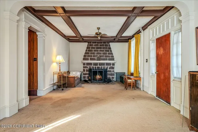a view of livingroom with furniture and a window
