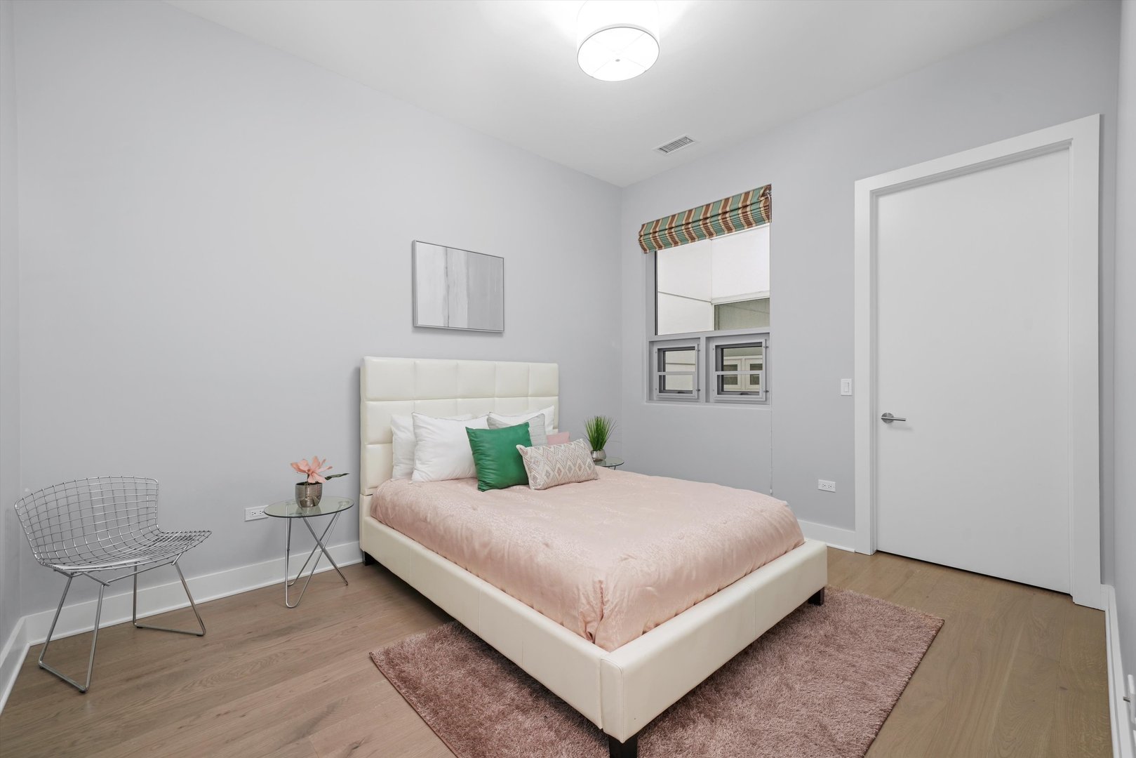 1128 West Adams Street, Unit 4E Chicago, IL 60607 - Photo 11 of 31 a bedroom with a bed and window