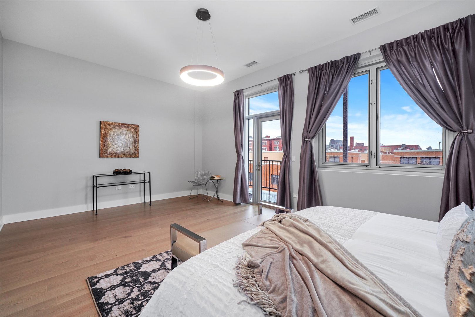 1128 West Adams Street, Unit 4E Chicago, IL 60607 - Photo 18 of 31 a bedroom with a bed and a window