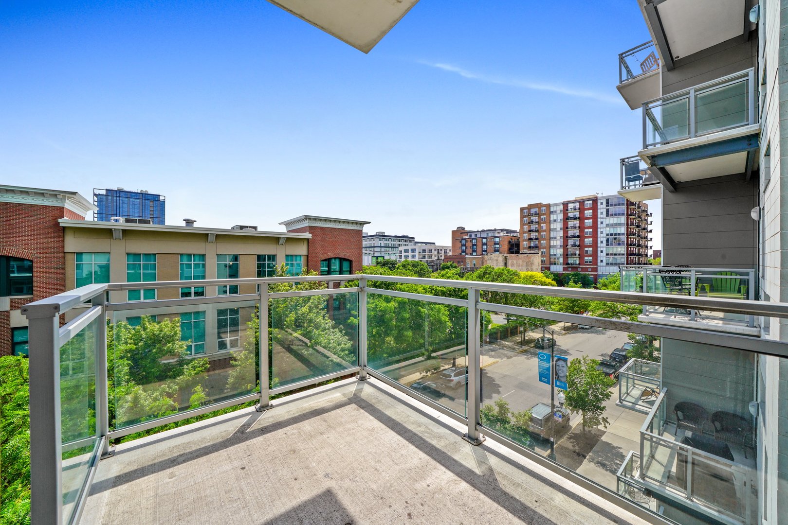 1128 West Adams Street, Unit 4E Chicago, IL 60607 - Photo 27 of 31 a view of building with an outdoor space