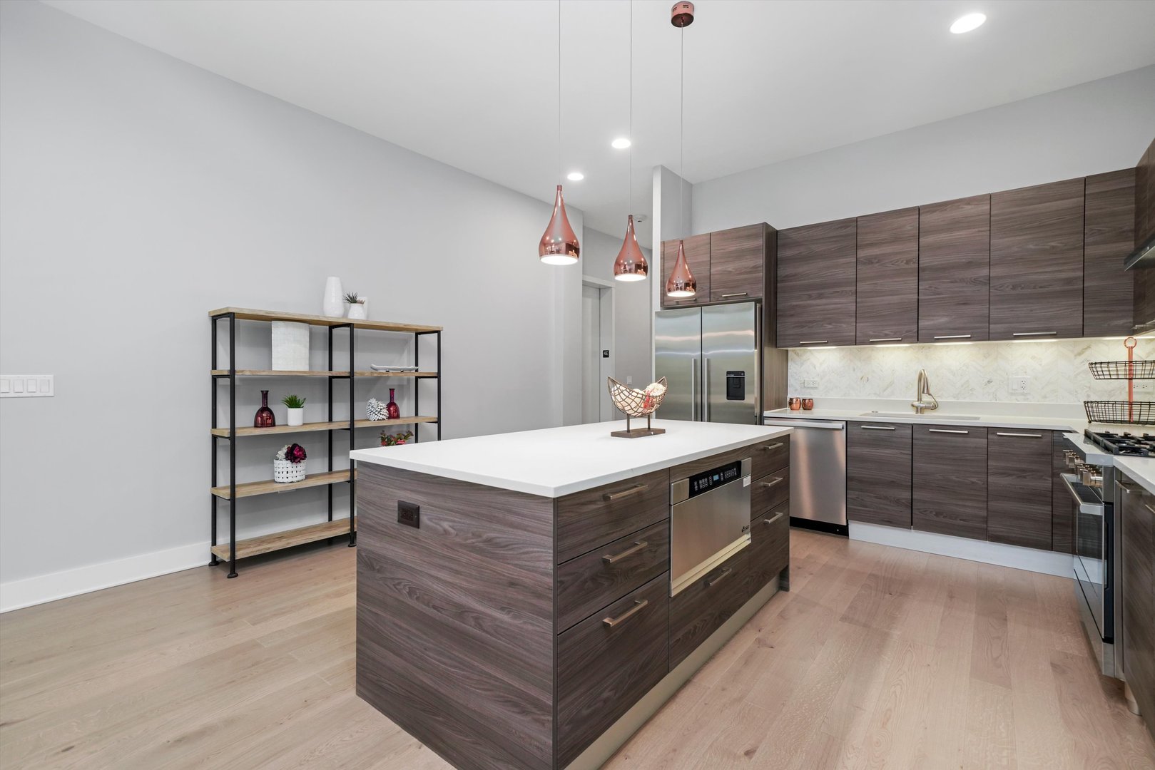 1128 West Adams Street, Unit 4E Chicago, IL 60607 - Photo 4 of 31 a kitchen with a stove and a refrigerator
