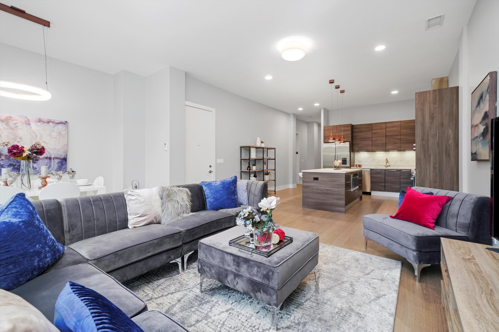 1128 West Adams Street, Unit 4E Chicago, IL 60607 - Photo 7 of 31 a living room with furniture or kitchen and a couch