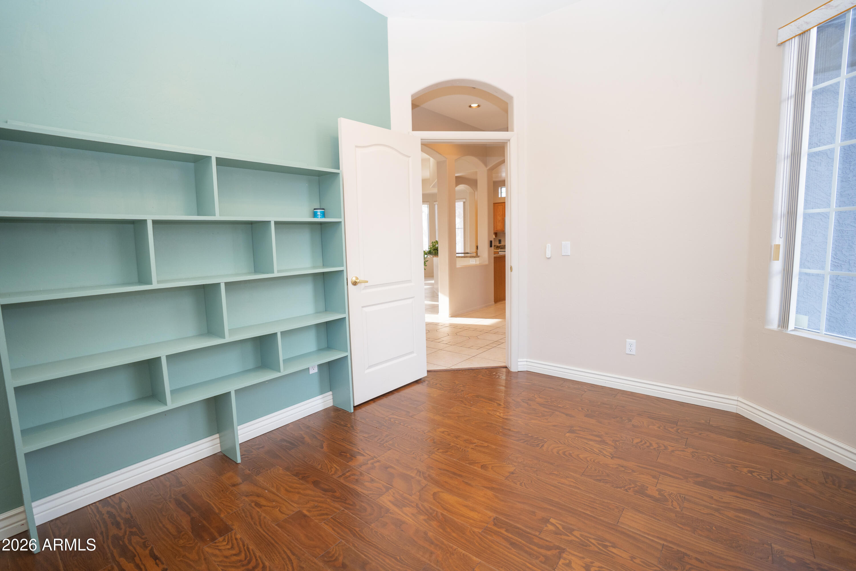 5320 Painted Desert Road Cornville, AZ 86325 - Photo 24 of 58 a view of a room with wooden floor and shelf