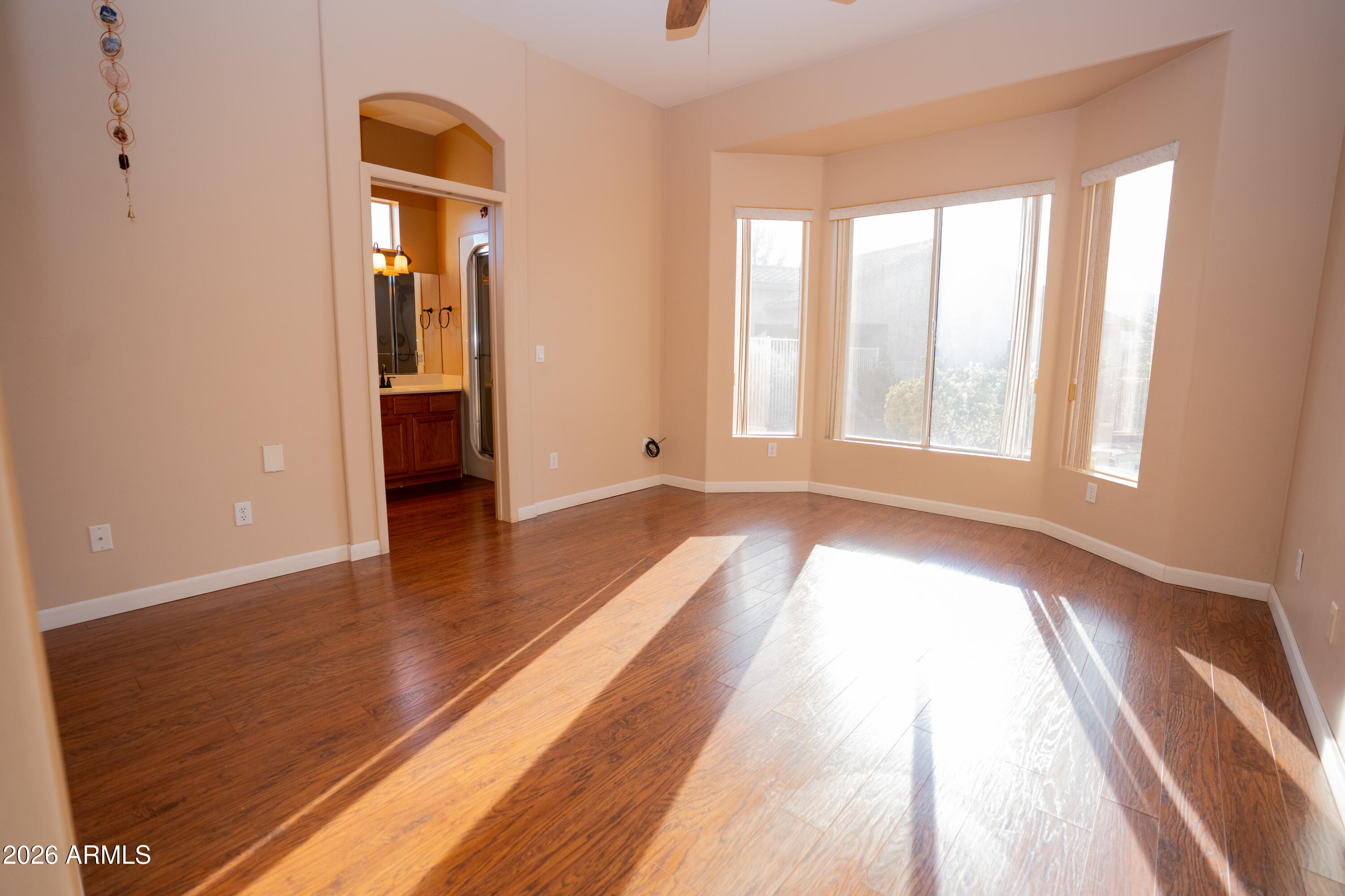 5320 Painted Desert Road Cornville, AZ 86325 - Photo 27 of 58 wooden floor in an empty room with a window