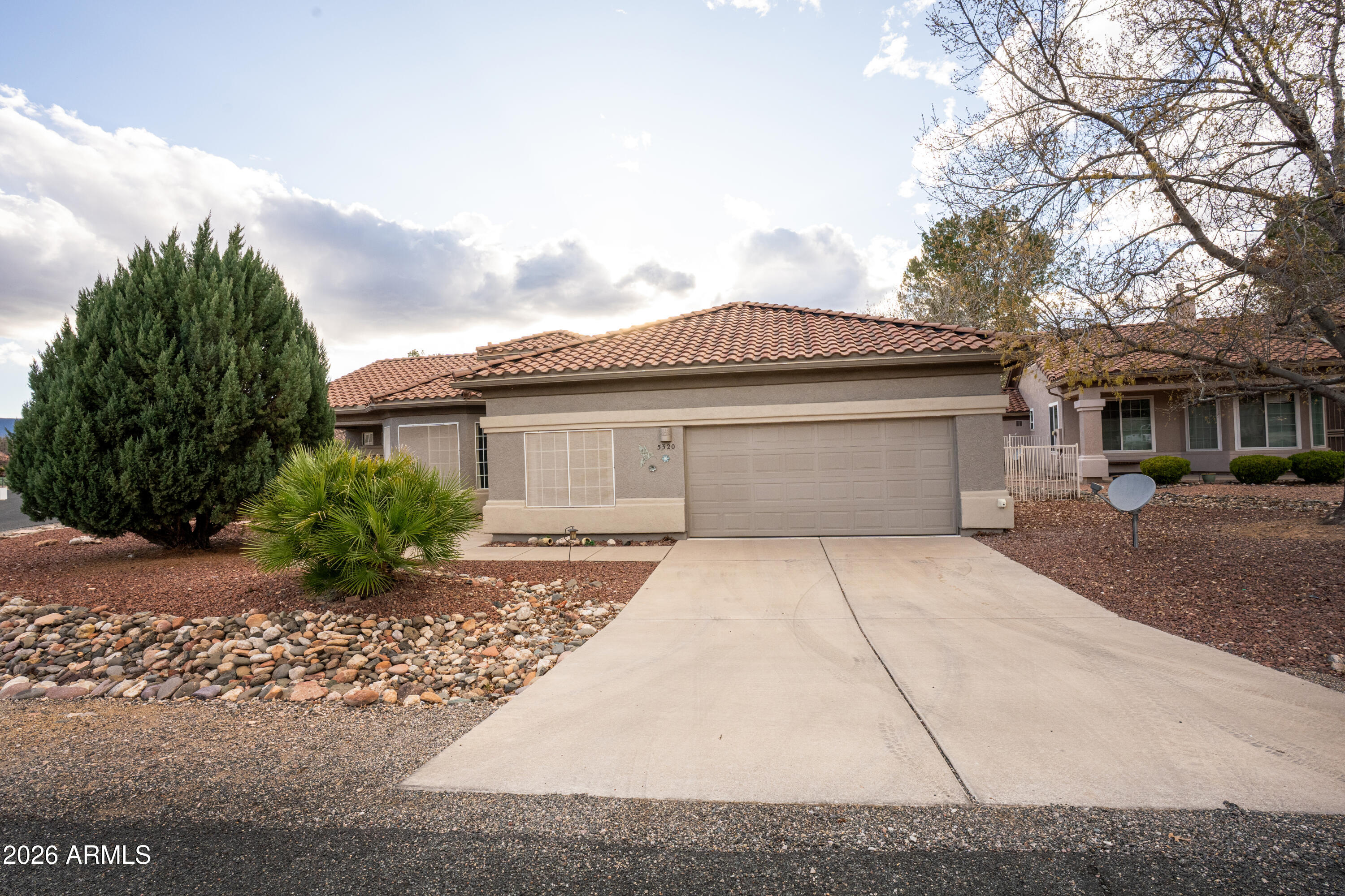 5320 Painted Desert Road Cornville, AZ 86325 - Photo 50 of 58 a front view of a house with a garden