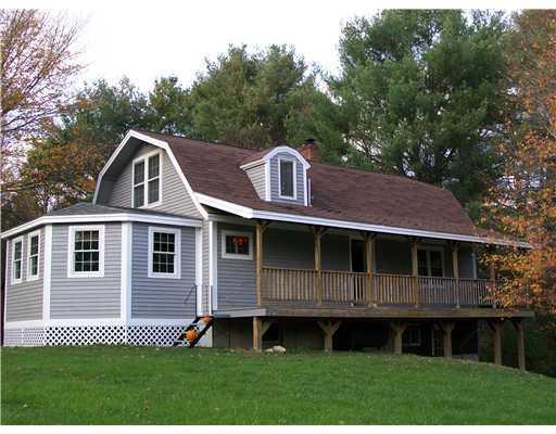 505 Langdon Road Richmond, ME 04357 - Photo 2 of 18 Exterior Front. The side porch...