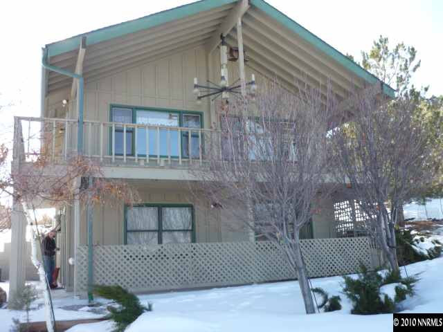 21980 Panhandle Road Reno, NV 89521 - Photo 1 of 9 a front view of a house with a yard