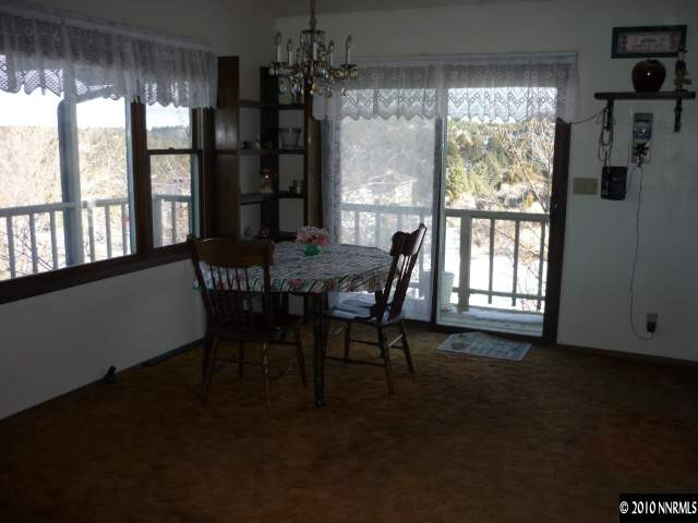 21980 Panhandle Road Reno, NV 89521 - Photo 5 of 9 a dining room with furniture and window