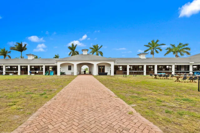 a view of an swimming pool with a outdoor seating