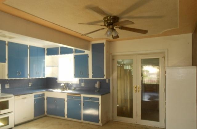 5780 East Bonnyview Road Redding, CA 96001 - Photo 4 of 17 a kitchen with a counter space cabinets and stainless steel appliances