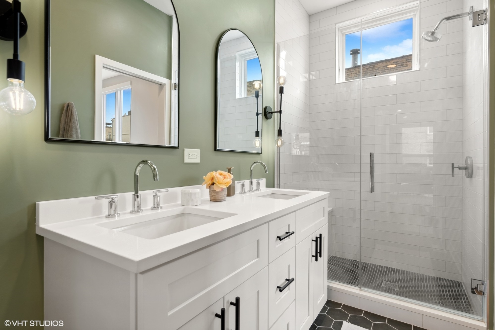 958 North Wood Street, Unit A Chicago, IL 60622 - Photo 12 of 17 a bathroom with a sink and a mirror