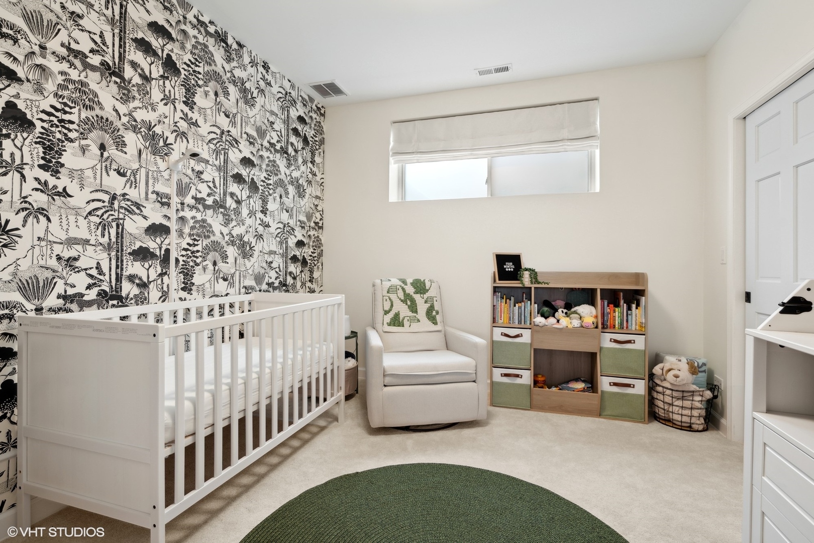 958 North Wood Street, Unit A Chicago, IL 60622 - Photo 13 of 17 a bedroom with furniture and baby crib