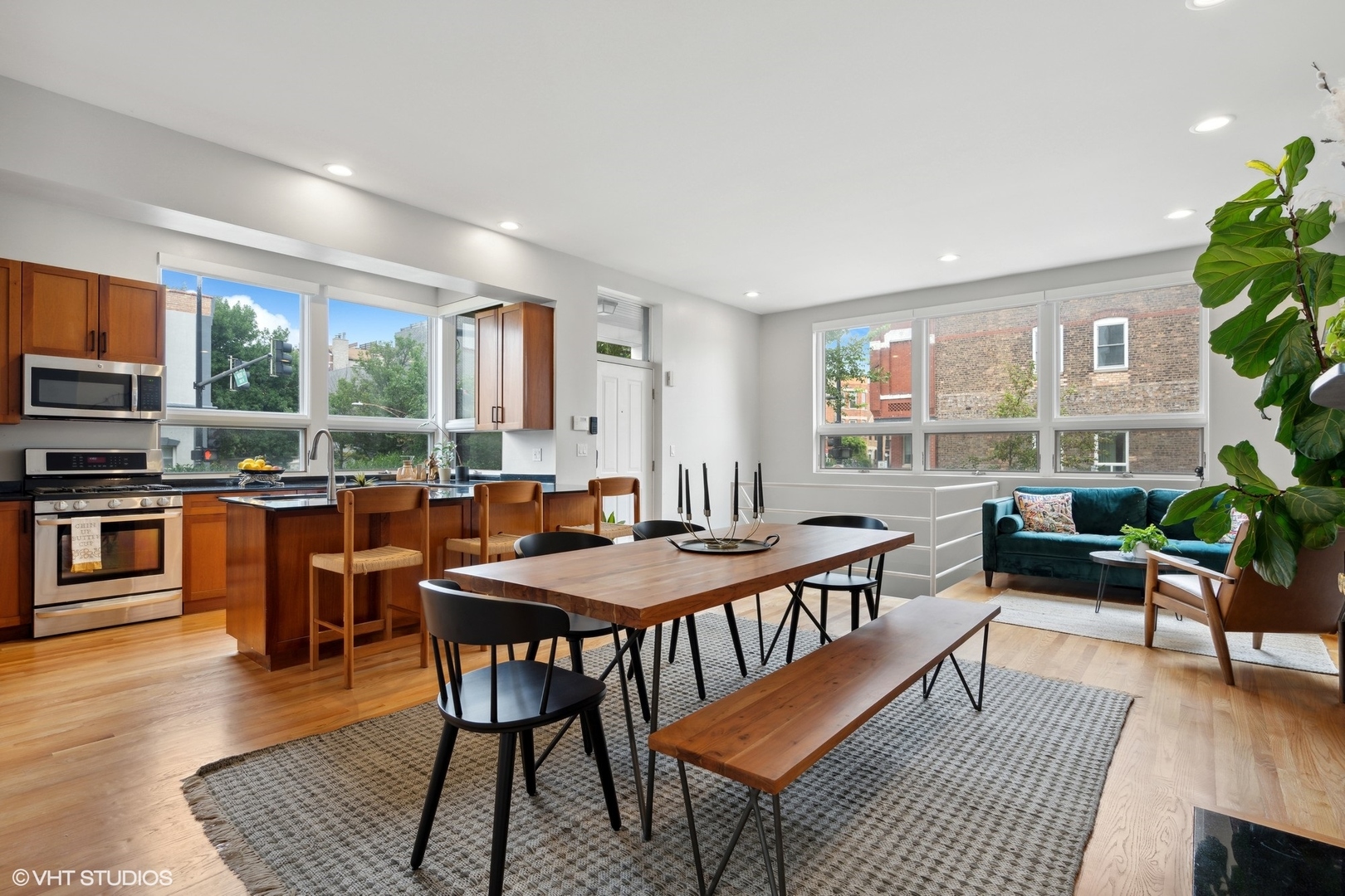 958 North Wood Street, Unit A Chicago, IL 60622 - Photo 4 of 17 a view of a dining room with furniture window and wooden floor