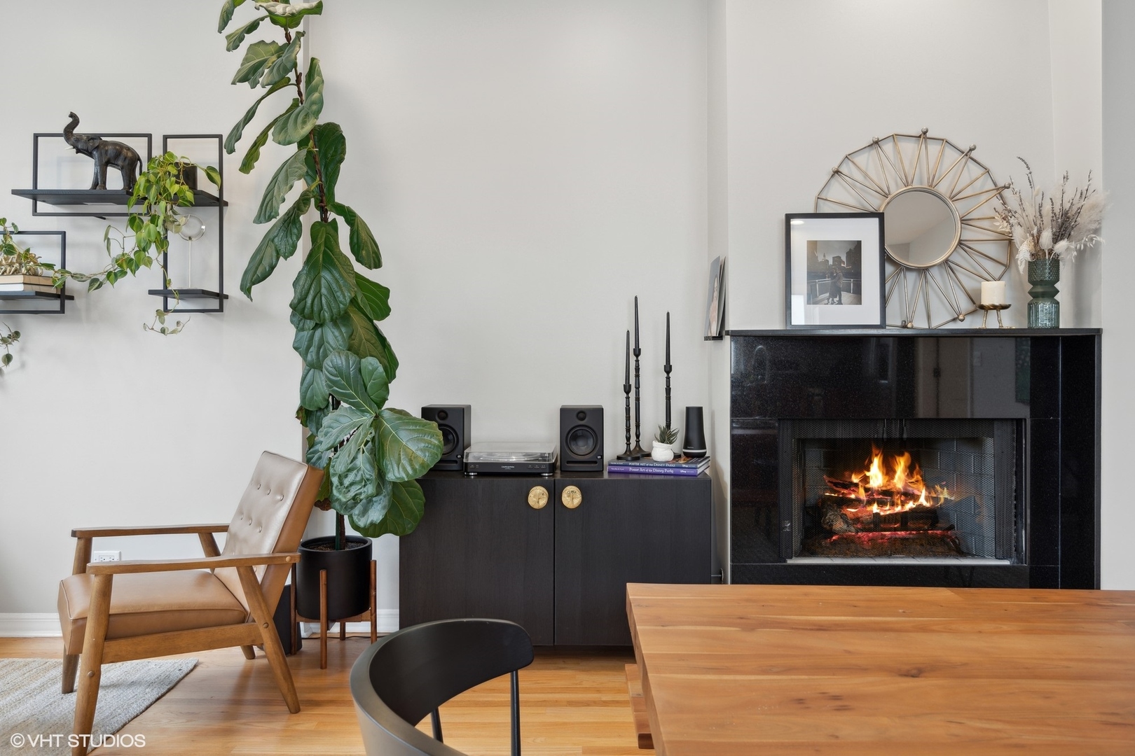 958 North Wood Street, Unit A Chicago, IL 60622 - Photo 7 of 17 a living room with furniture and a fireplace