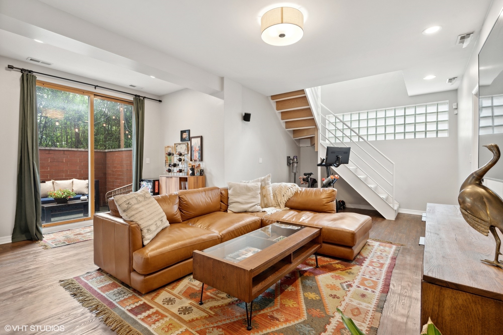 958 North Wood Street, Unit A Chicago, IL 60622 - Photo 8 of 17 a living room with furniture and a large window