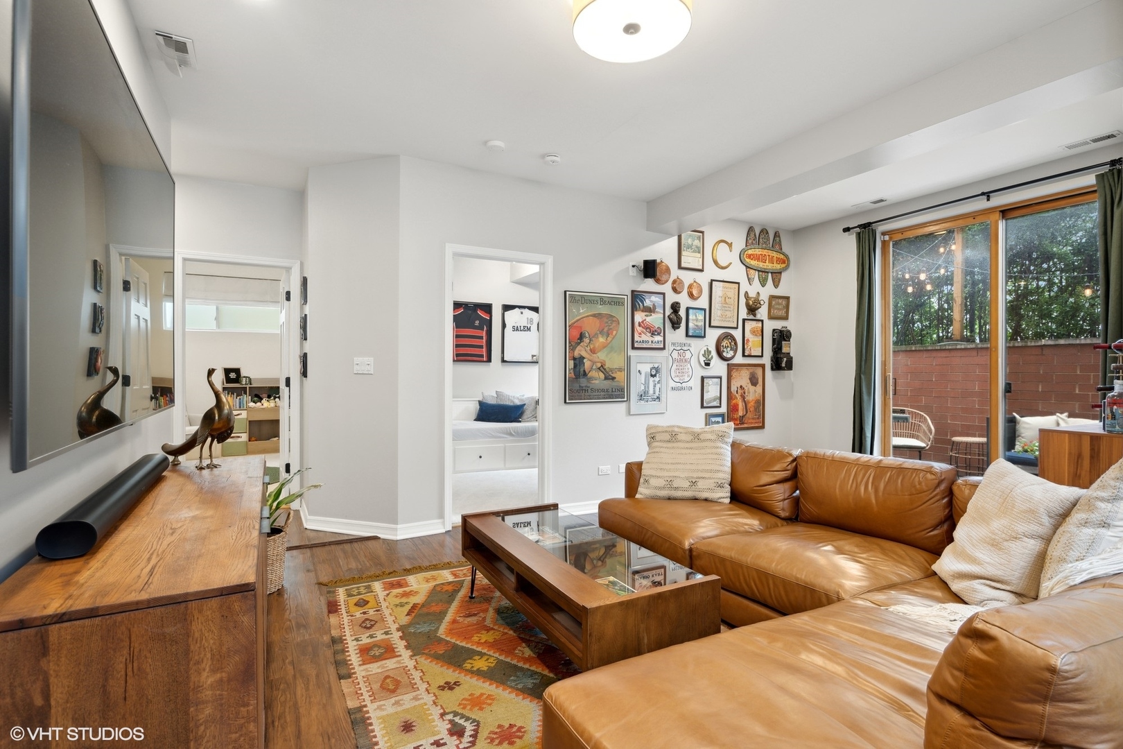 958 North Wood Street, Unit A Chicago, IL 60622 - Photo 9 of 17 a living room with furniture and a large window