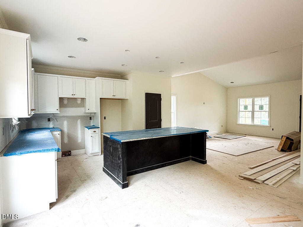 9574 Stallings Road Spring Hope, NC 27882 - Photo 15 of 31 a bed room with a bed and a window