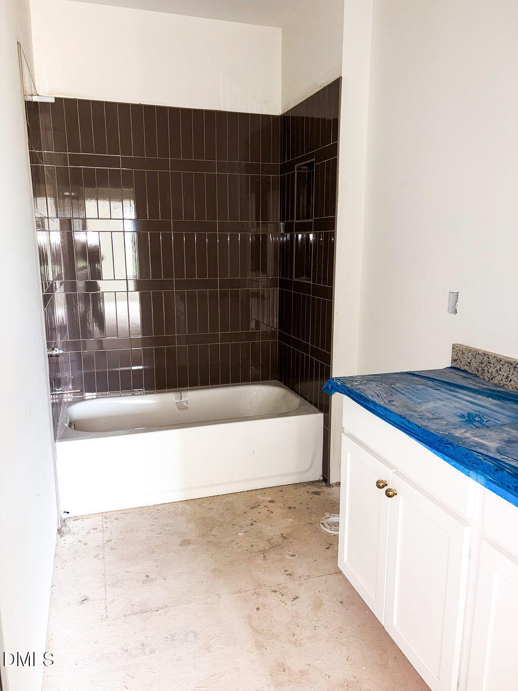 9574 Stallings Road Spring Hope, NC 27882 - Photo 19 of 31 a bathroom with a bathtub and a shower