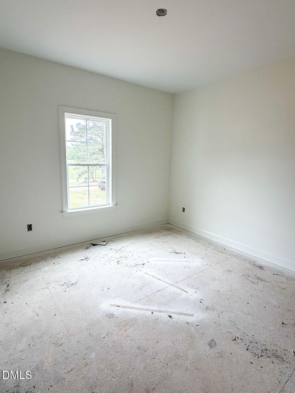 9574 Stallings Road Spring Hope, NC 27882 - Photo 20 of 31 an empty room with a window